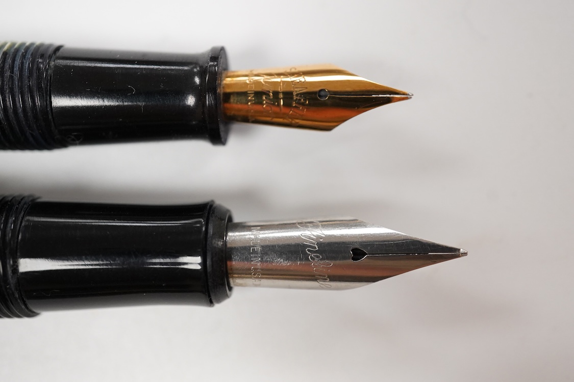 A pair of Sheaffer lever filled pens with nickel trim